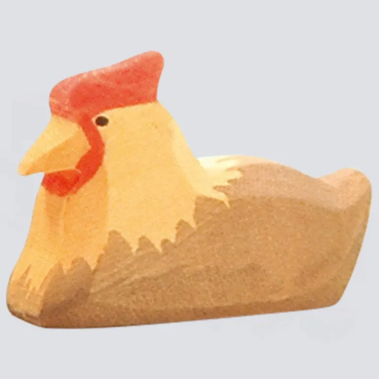 Ostheimer Holzfigur Huhn braun liegend