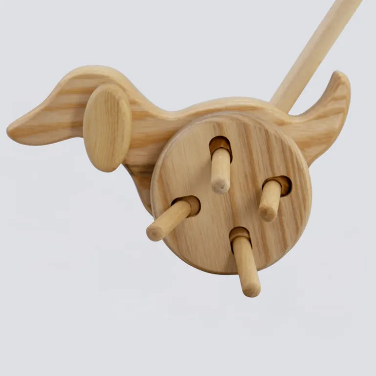 Schiebetier Hund mit Rasselstäbchen